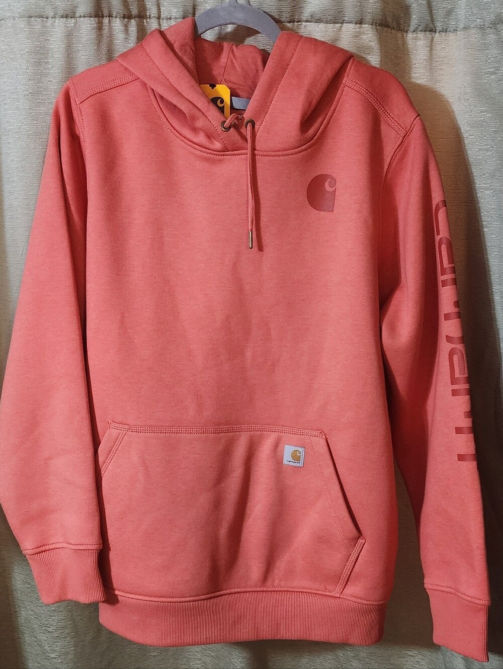 Carhartt Coral-Pink Pullover Hoodie with Sleeve Script